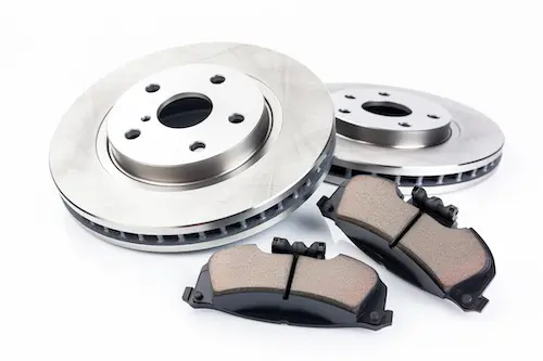 car-brakes-beside-brake-pads.webp